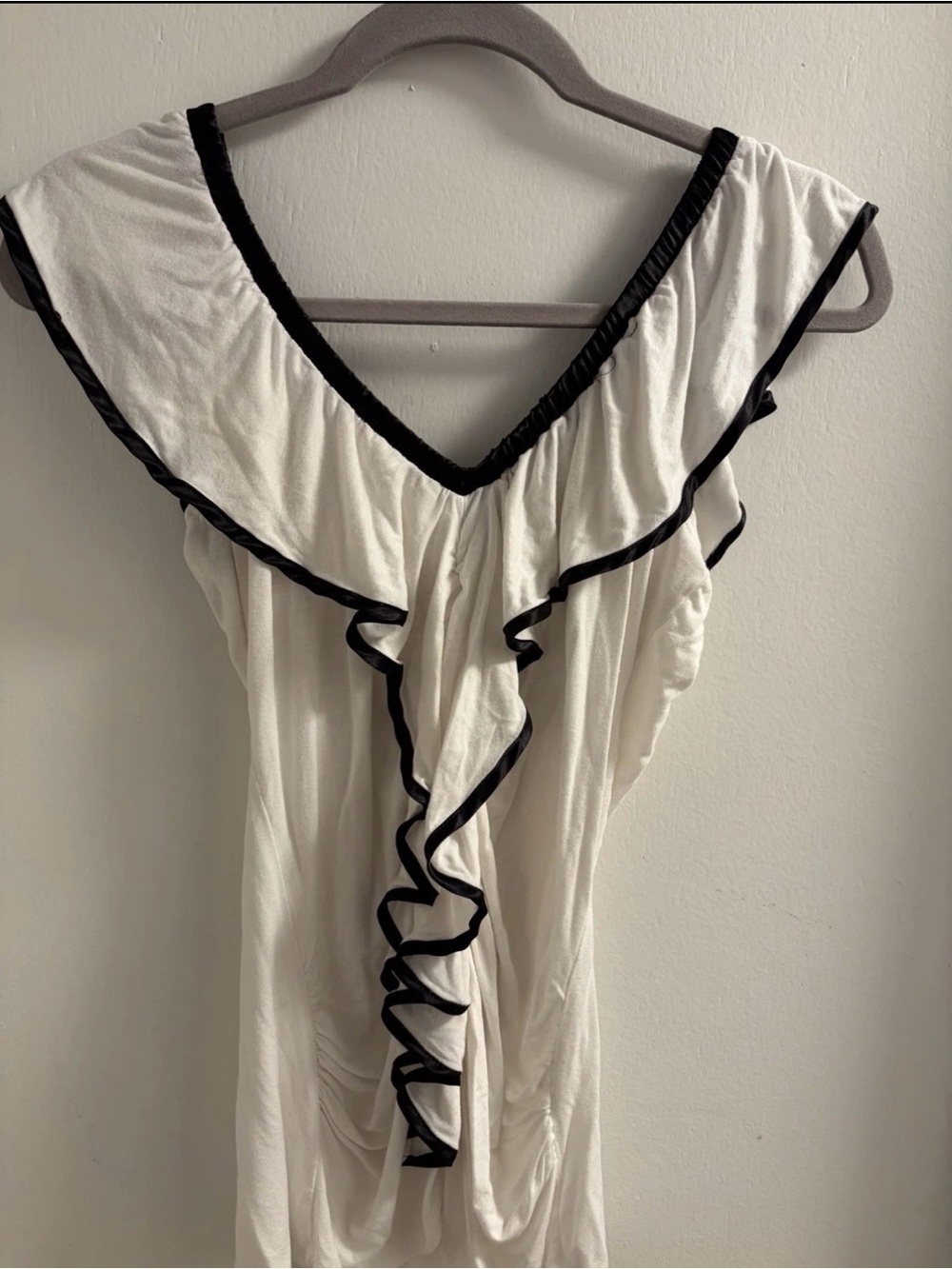 Unyx White V-Neck Ruffle Blouse with Black Trim